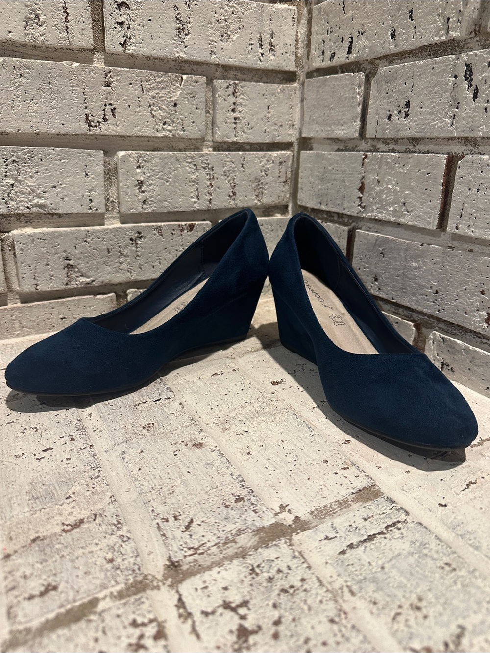 Navy blue suede wedge heels